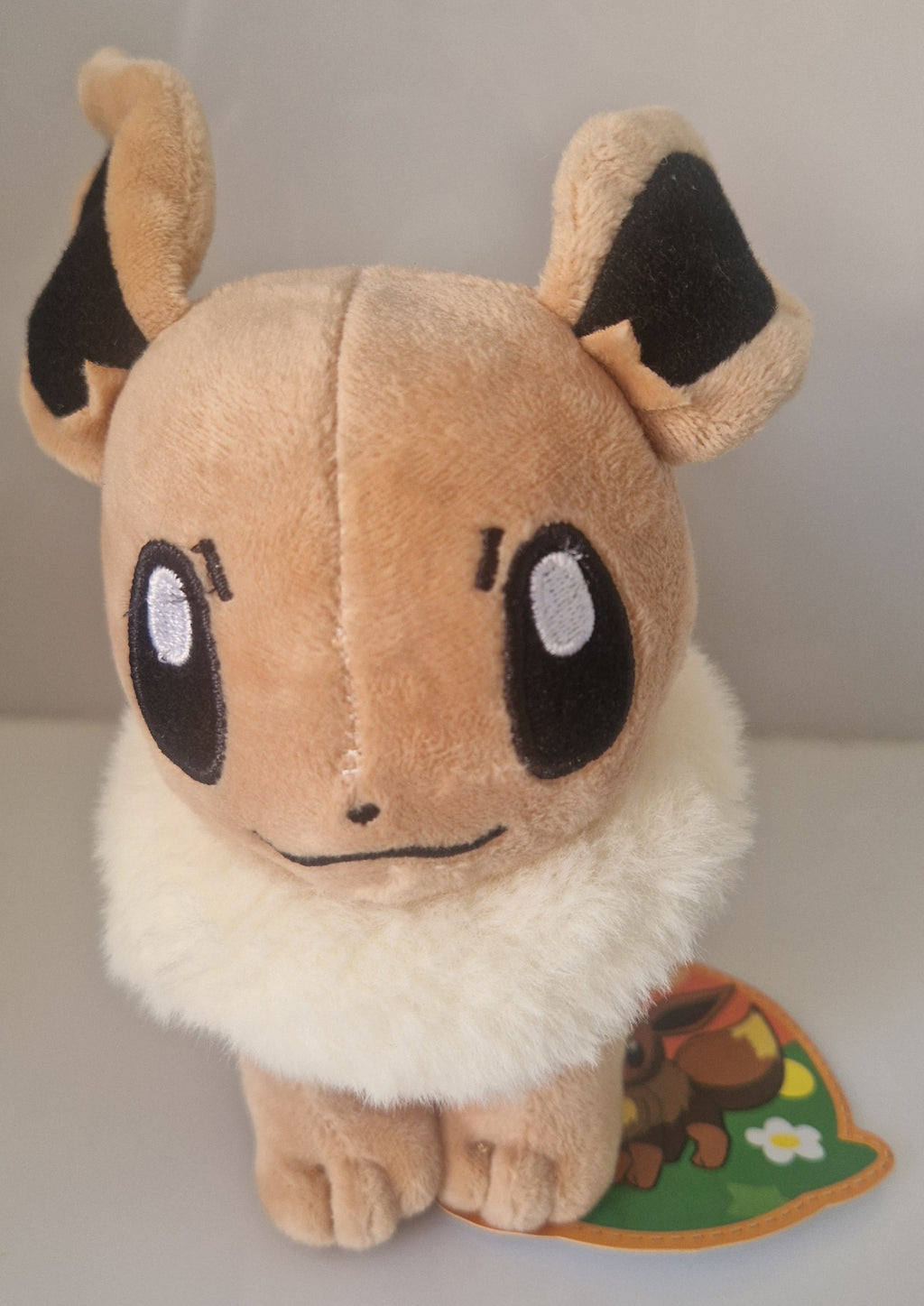 Front view of Pokémon Eevee plush soft toy