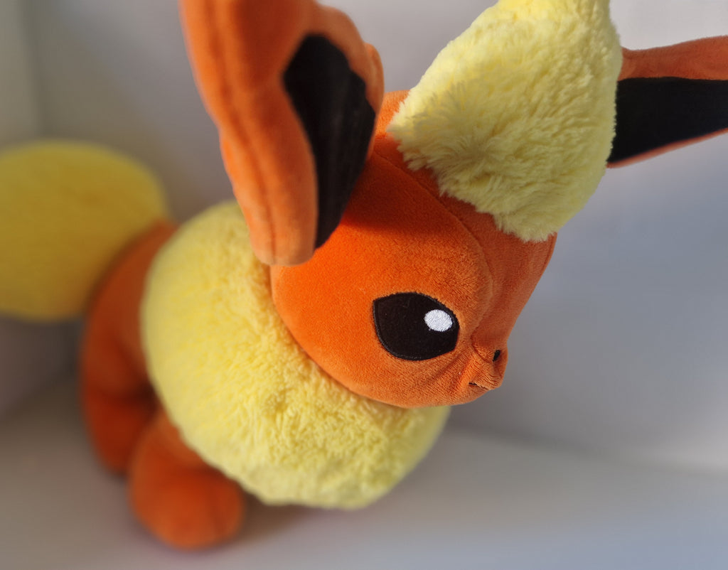Opposite side view of official Pokémon Flareon Build-A-Bear Workshop plush