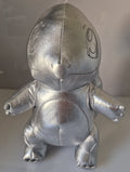 Front view of official silver metallic Pokémon Charmander plush