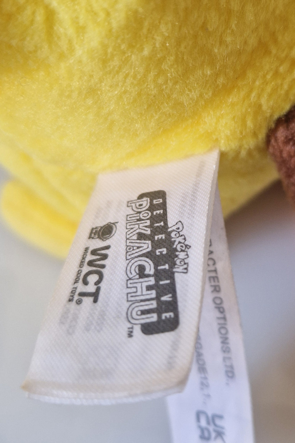 Official label detail on Pokémon Detective Pikachu plush
