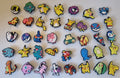 Selection of Pokémon-style shoe charms available in mystery sets