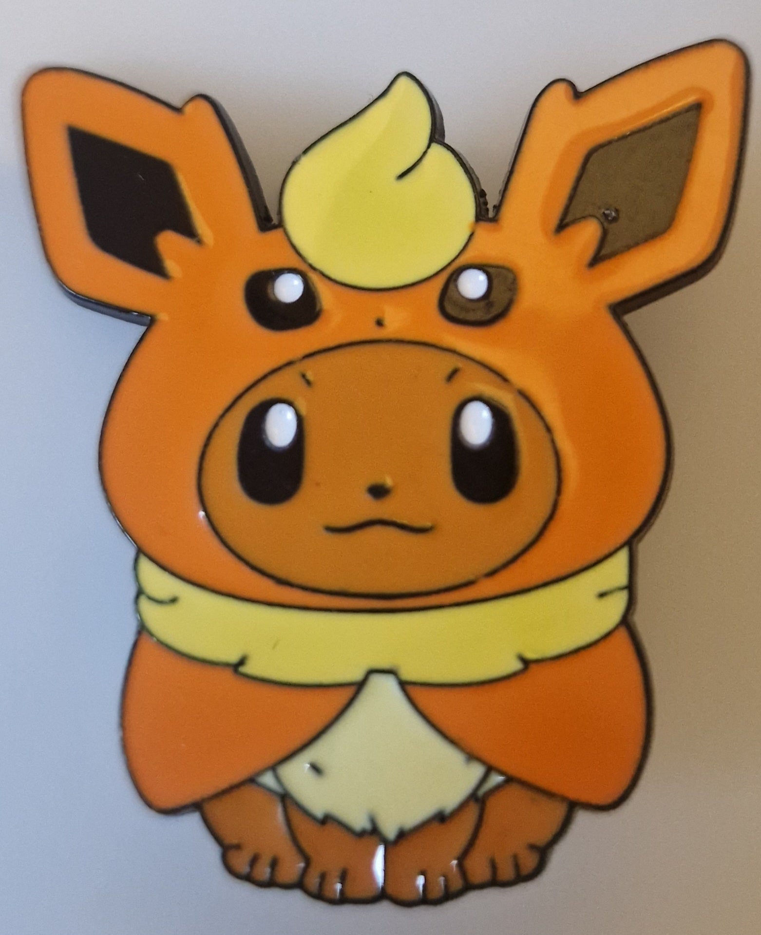 Pokémon-style brooch pin – Eevee in Flareon Costume